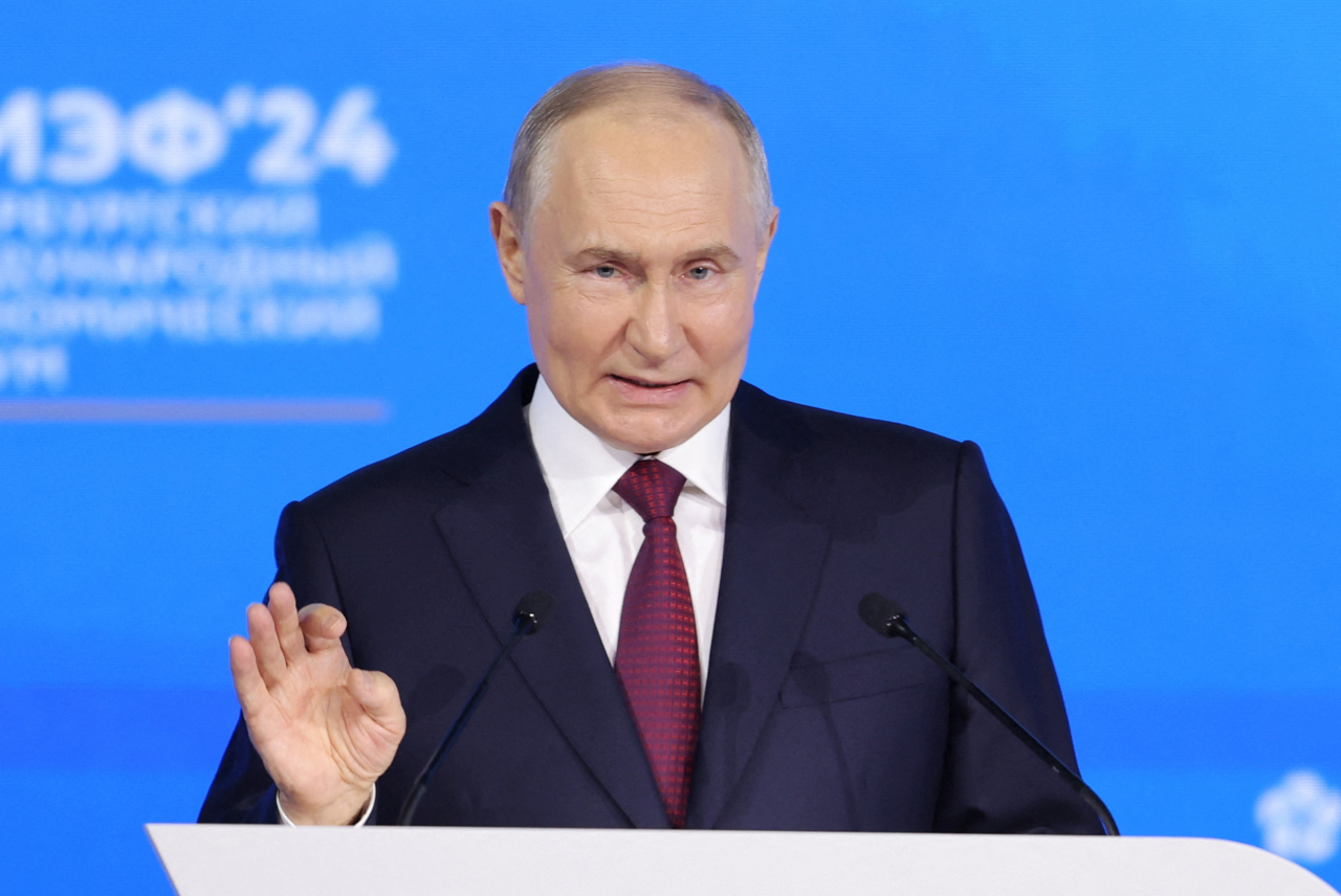 Putin calls for major expansion of Russian financial markets, cutting use of Western currencies