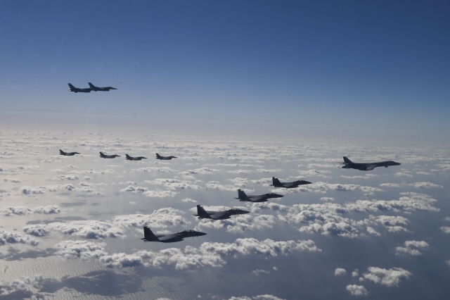 South Korean, US and Japanese fighter jets stage a joint aerial drill over the air defense identification zone between South Korea and Japan on Sunday in response to North Korea’s intercontinental ballistic missile firing on Oct. 31. (Yonhap)