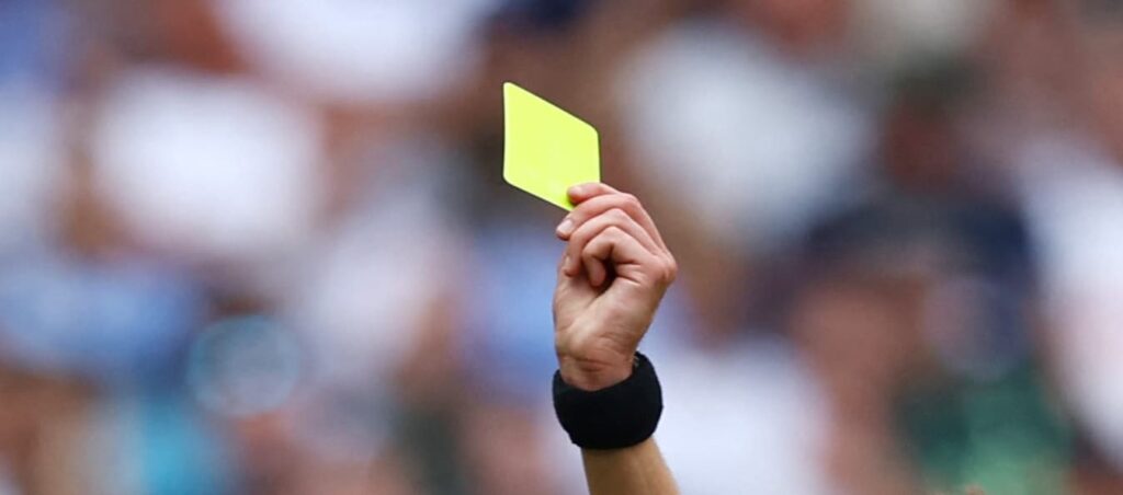 How many yellow cards result in a ban?